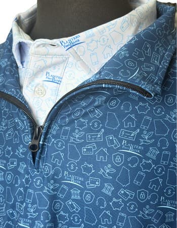Close-up of a custom all-over print Uncorp Wear quarter-zip for Planters First Bank