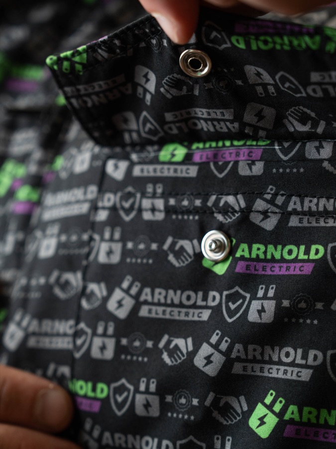 Close-up of the snap placket on a custom Arnold Electric shirt